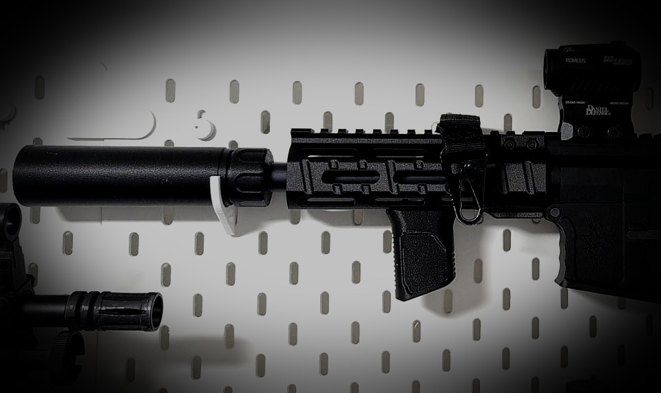 Rifle with printed handguard and suppressor